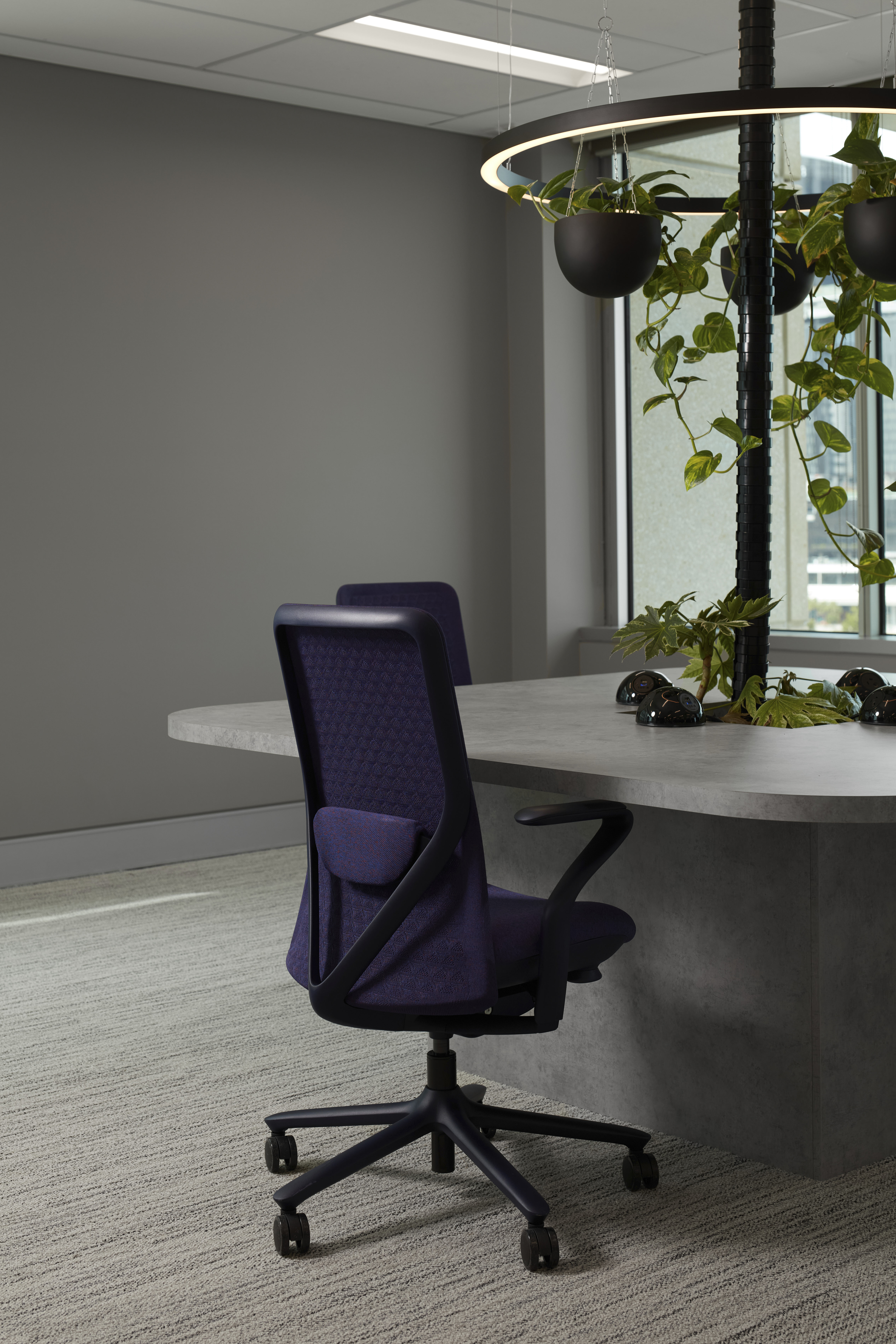 office chair with a blue mesh back