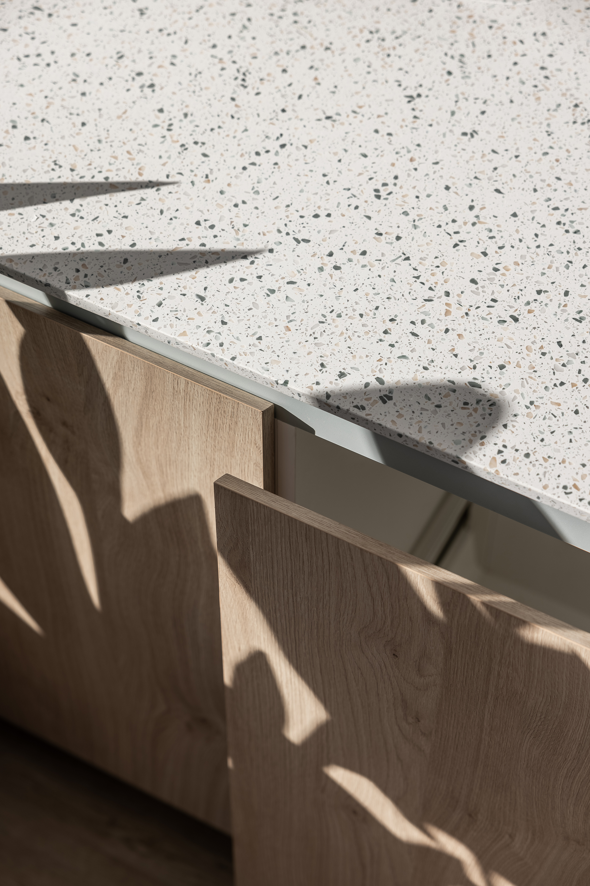 kitchen countertop with a speckled terrazzo surface
