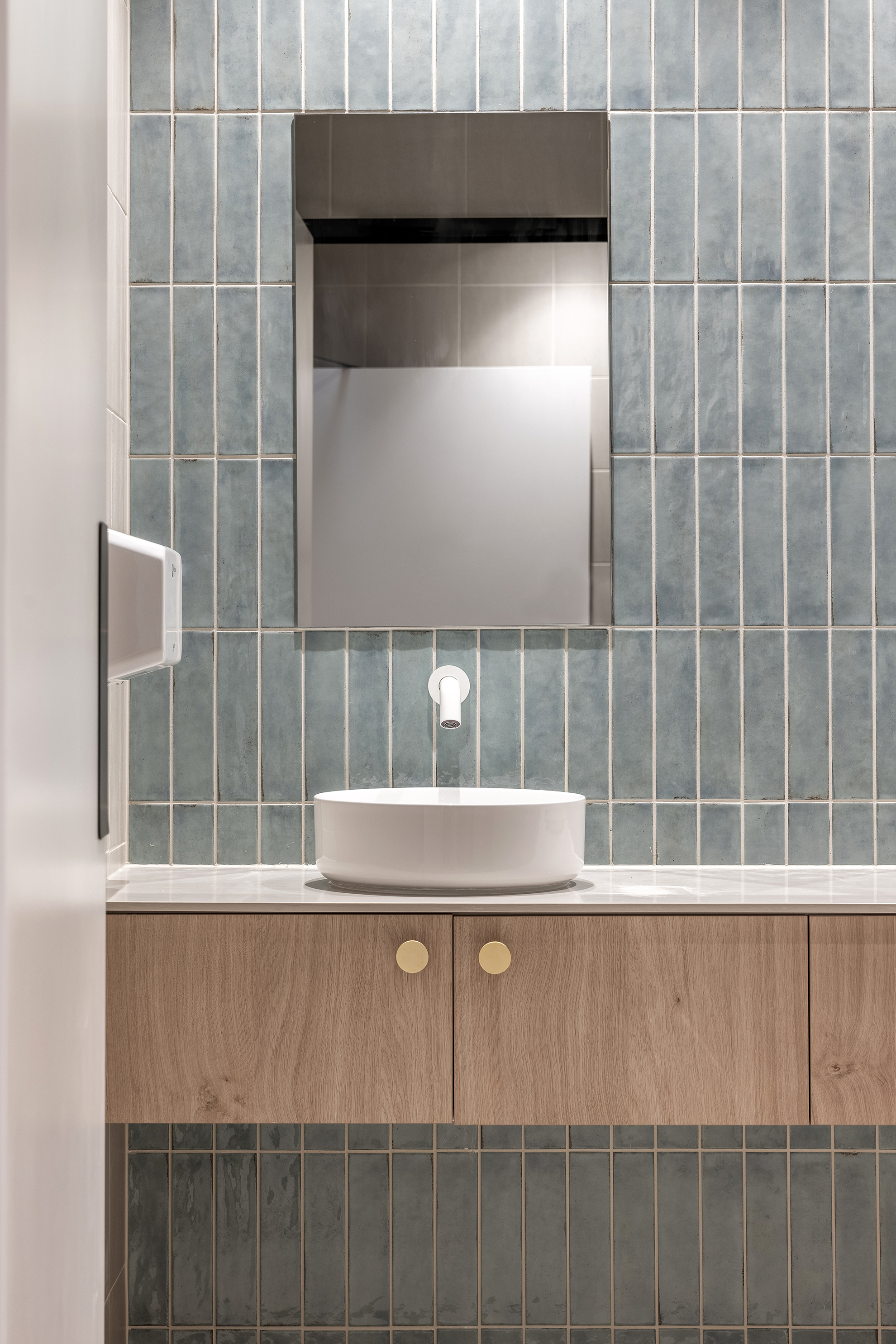 bathroom vanity with a white countertop