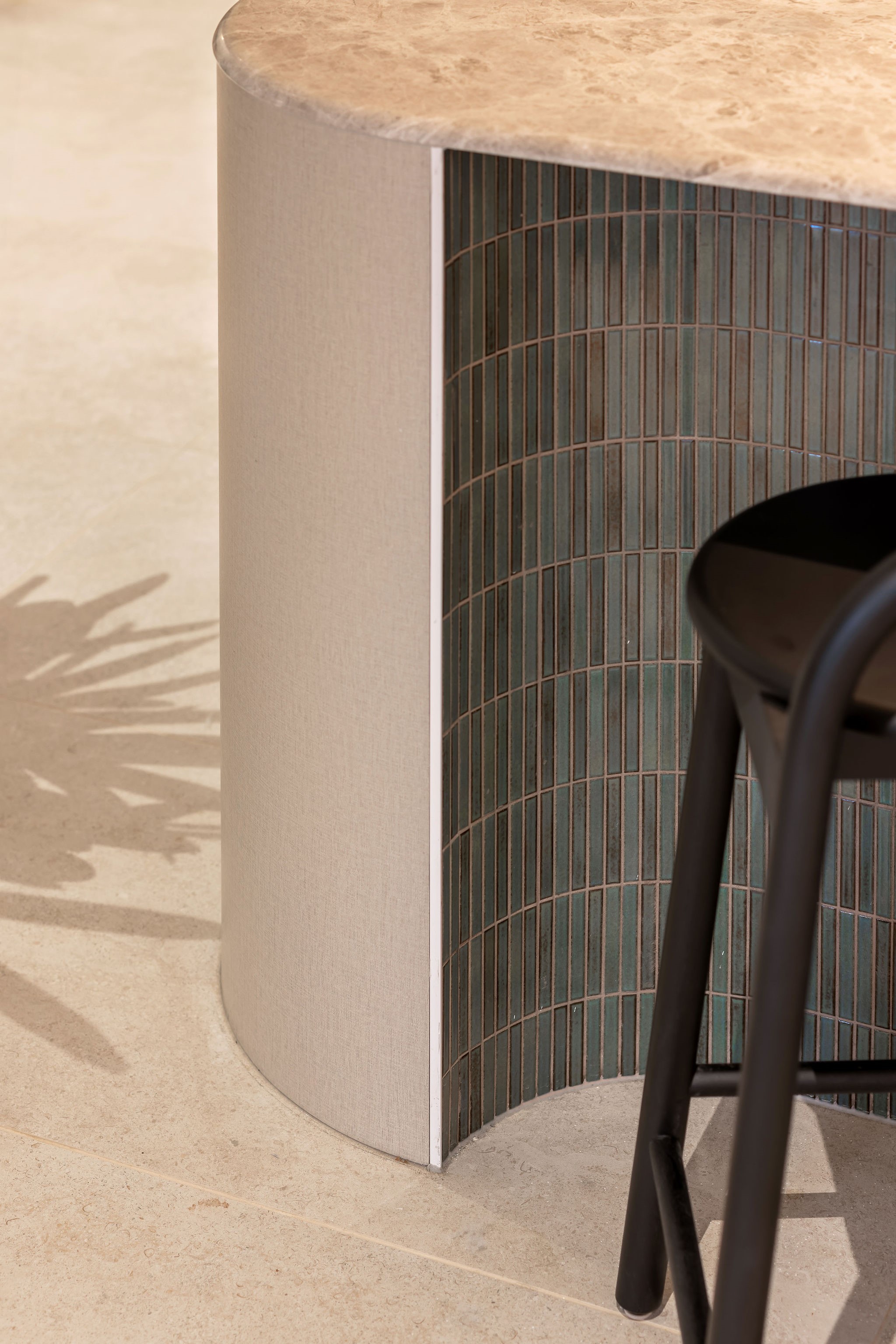 countertop with a curved marble top