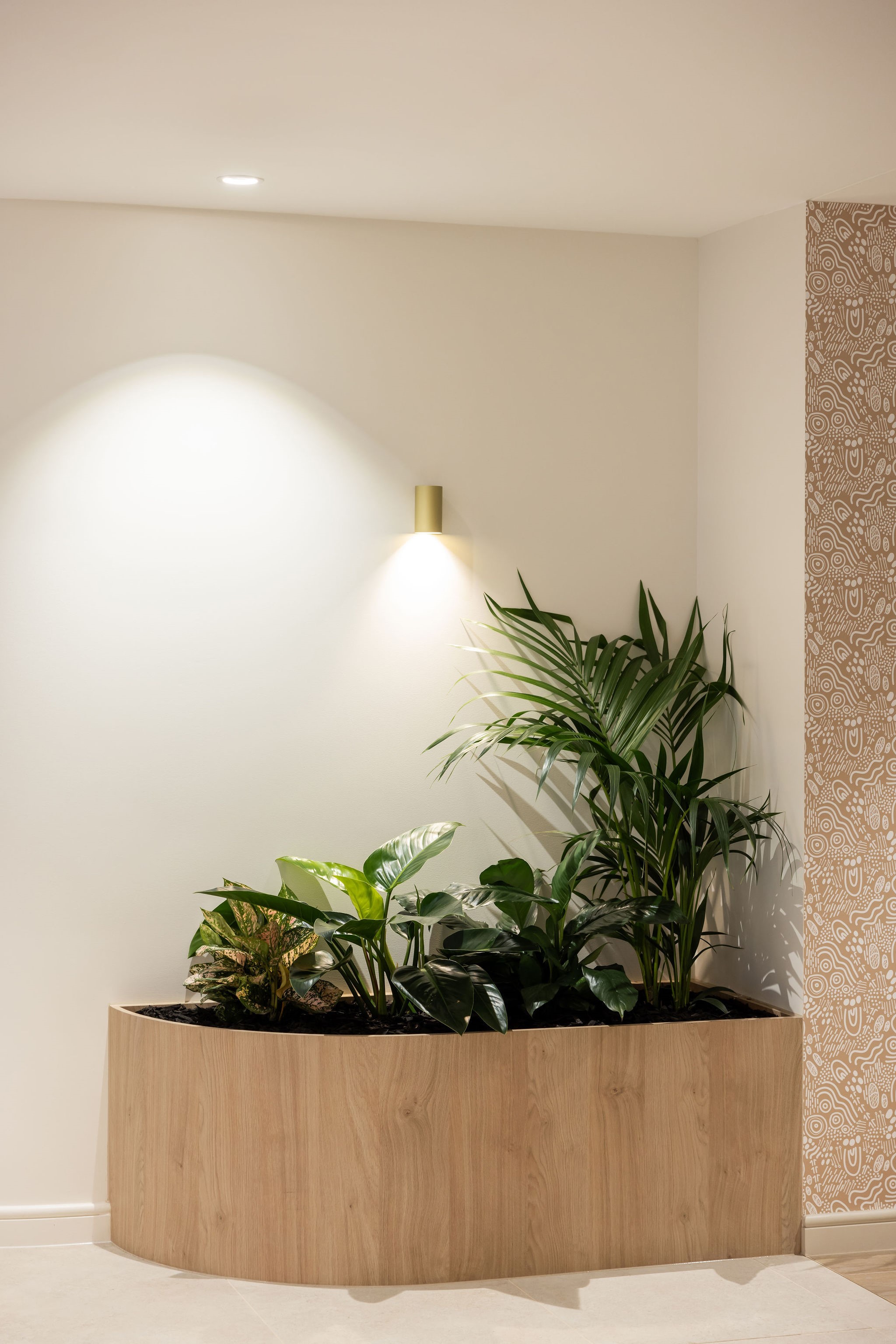 office corner with a wooden planter